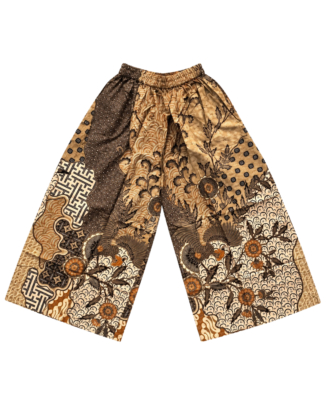 A pair of wide-leg cropped pants featuring a complex batik-style pattern in brown, gold, and beige, with traditional motifs including waves, floral elements, and geometric shapes.