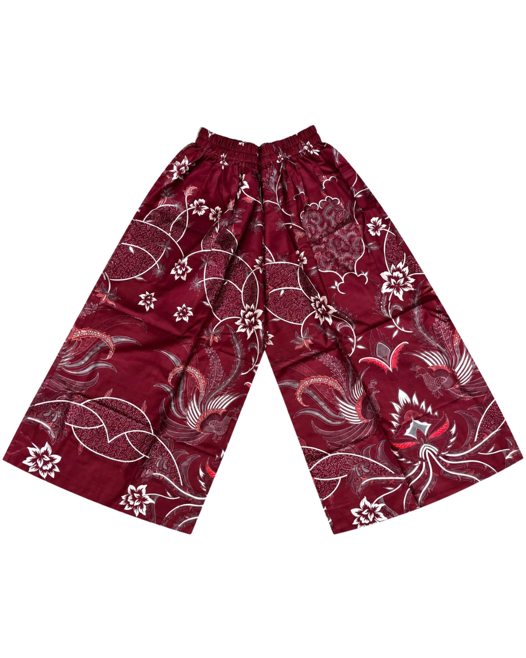 A pair of wide-leg, cropped pants in deep burgundy with a white and silver-toned floral and vine pattern, laid flat against a white background.