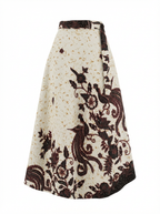 Long skirt with intricate brown floral patterns on a white background