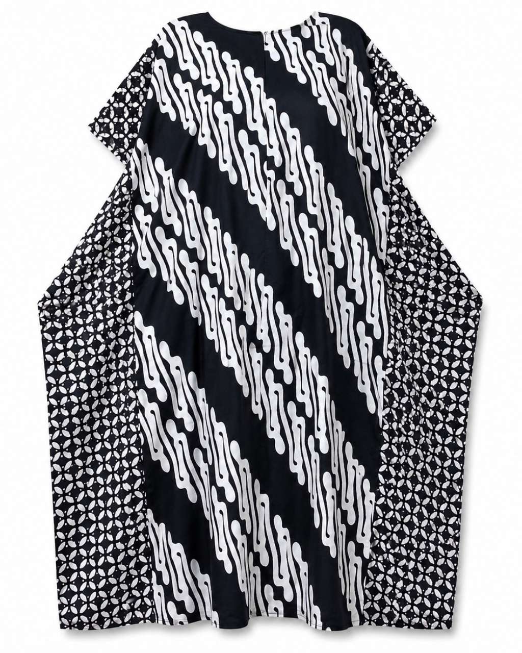 A loose, short-sleeved tunic dress with a bold black and white patterned design, featuring diagonal wavy stripes on the front and geometric diamond patterns on the sides, shown against a plain white background.