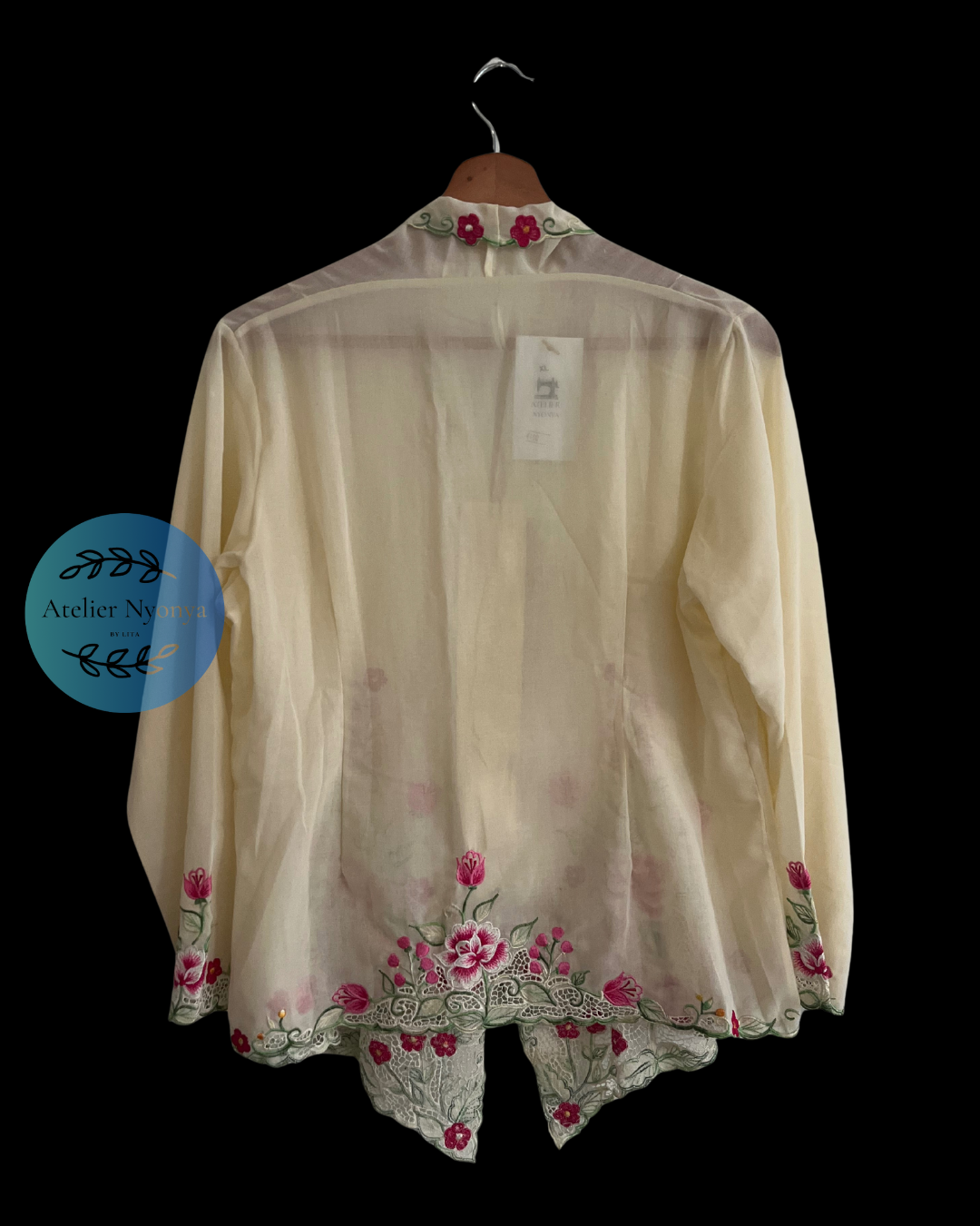 Beige embroidered kebaya kerancang