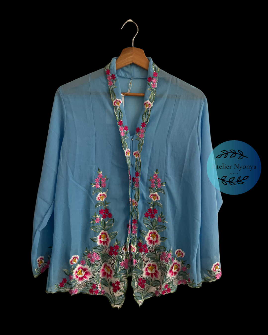 Blue embroidered kebaya kerrancang