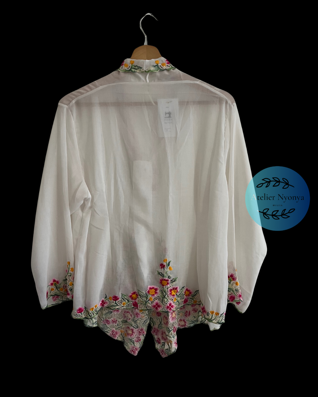 White embroidered kebaya kerancang
