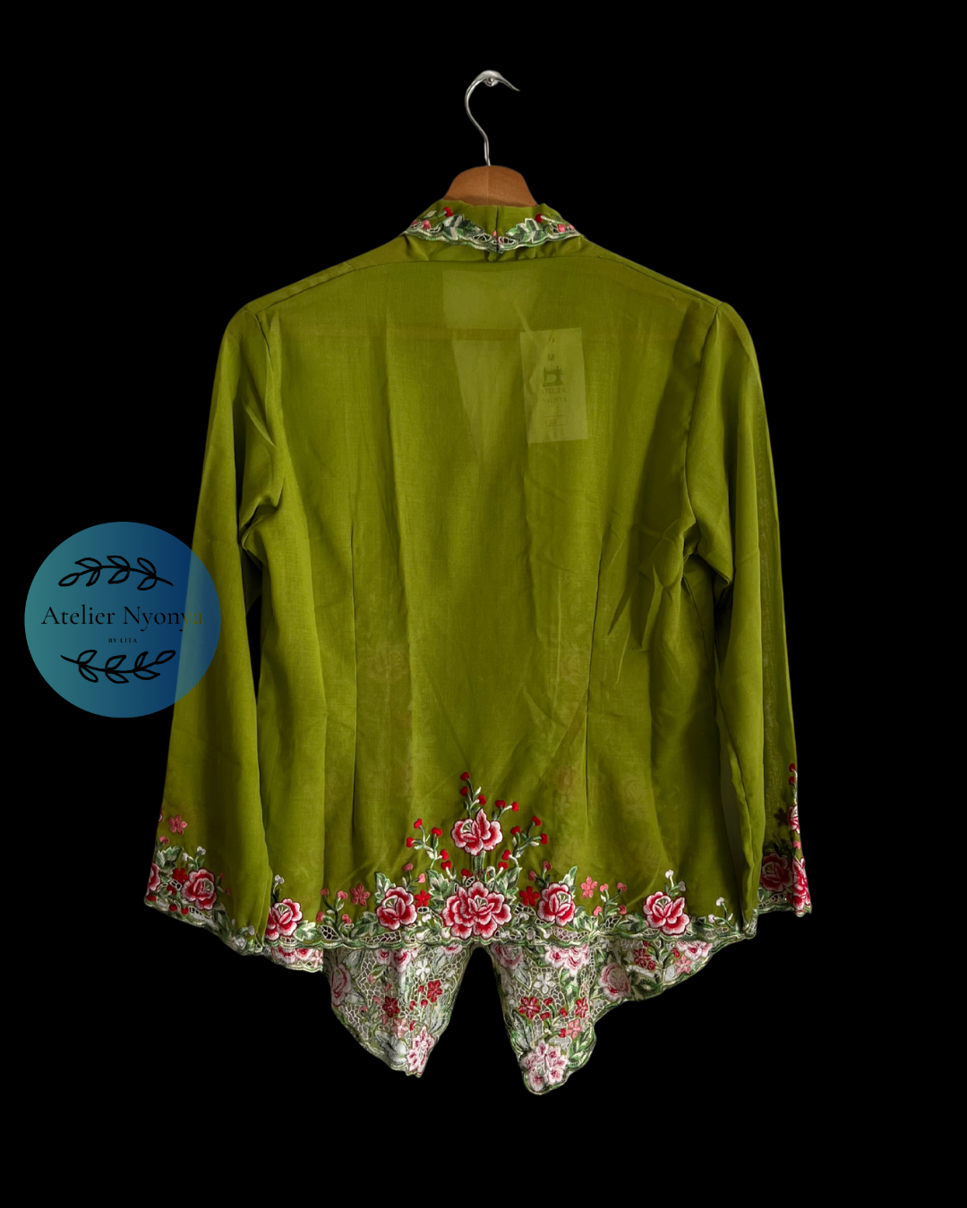 Green kebaya kerancang with floral embroidery 