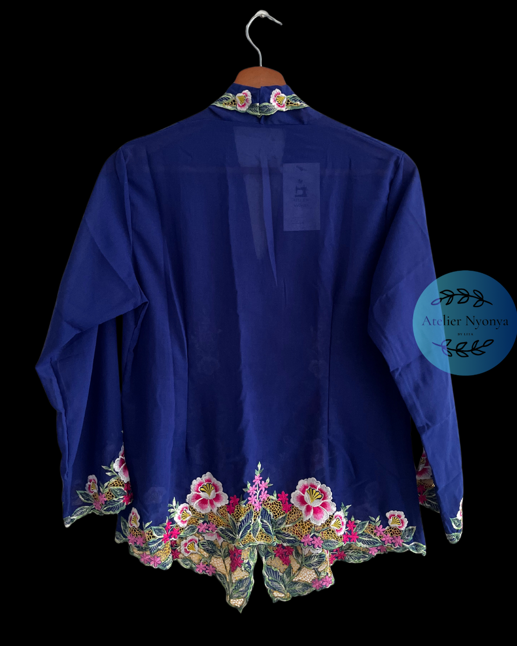 Blue embroidered kebaya kerancang