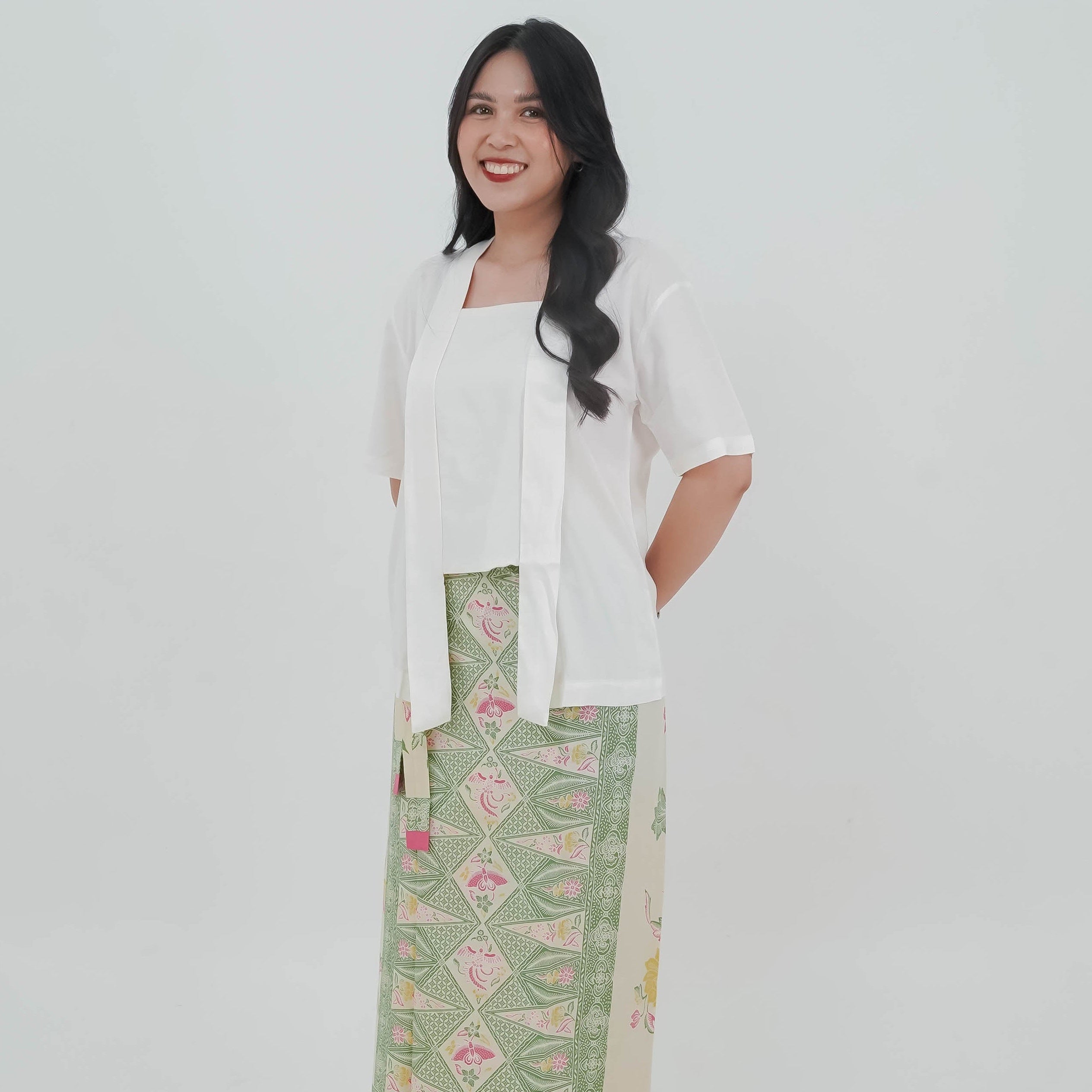 Kebaya kutubaru melati paired with wrap batik skirt