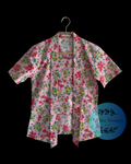 short sleeve kebaya kutubaru made from cottob with small flower motif in pink