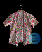 short sleeve kebaya kutubaru made from cottob with small flower motif in pink