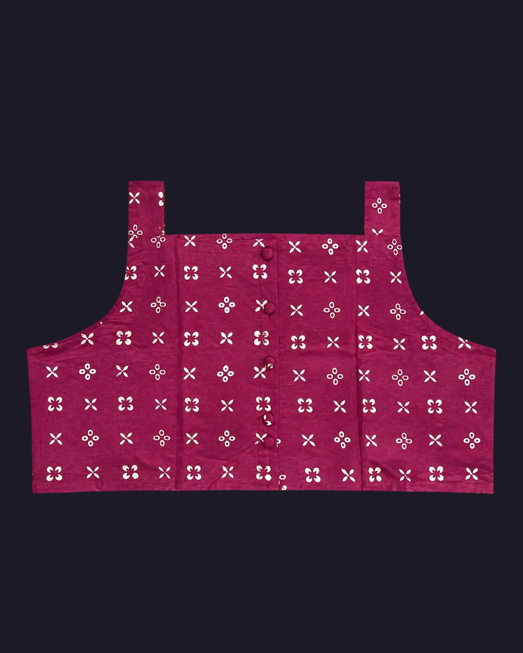 Red apron with white floral pattern on a black background